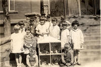 The primary children and their doll house
