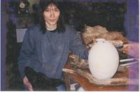 Artist in residence with egg sculpture