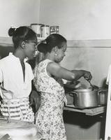 Women frying fish
